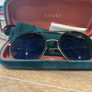Gucci Sunglasses- Black and Gold (Circular Lens) GG0061S.